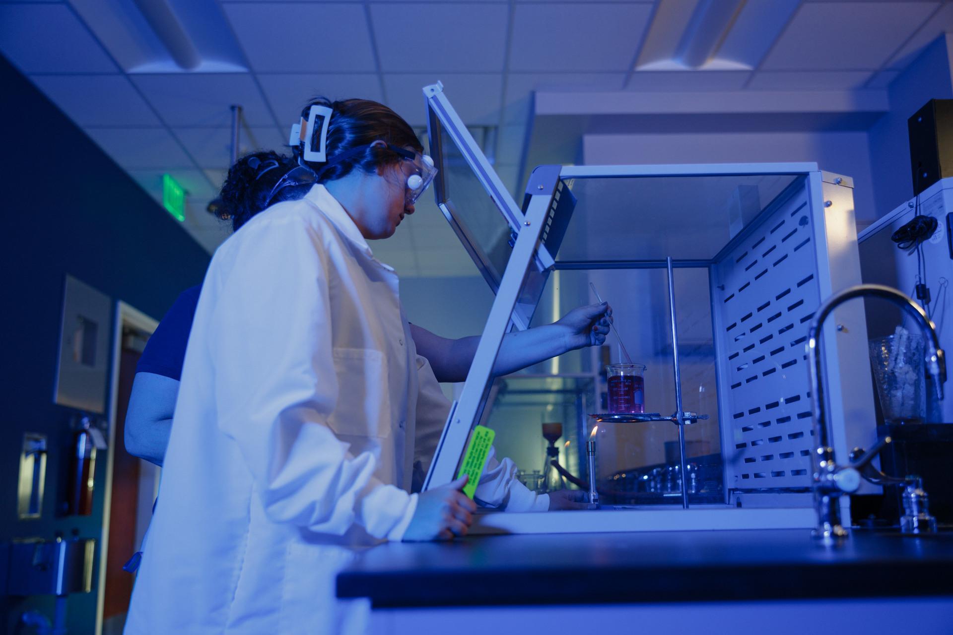 Chemistry students participating in a lab assignment